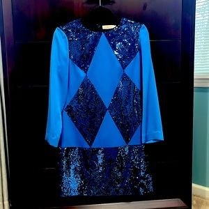 This is a Tory Burch dress never been worn, is mint condition, ask for photos